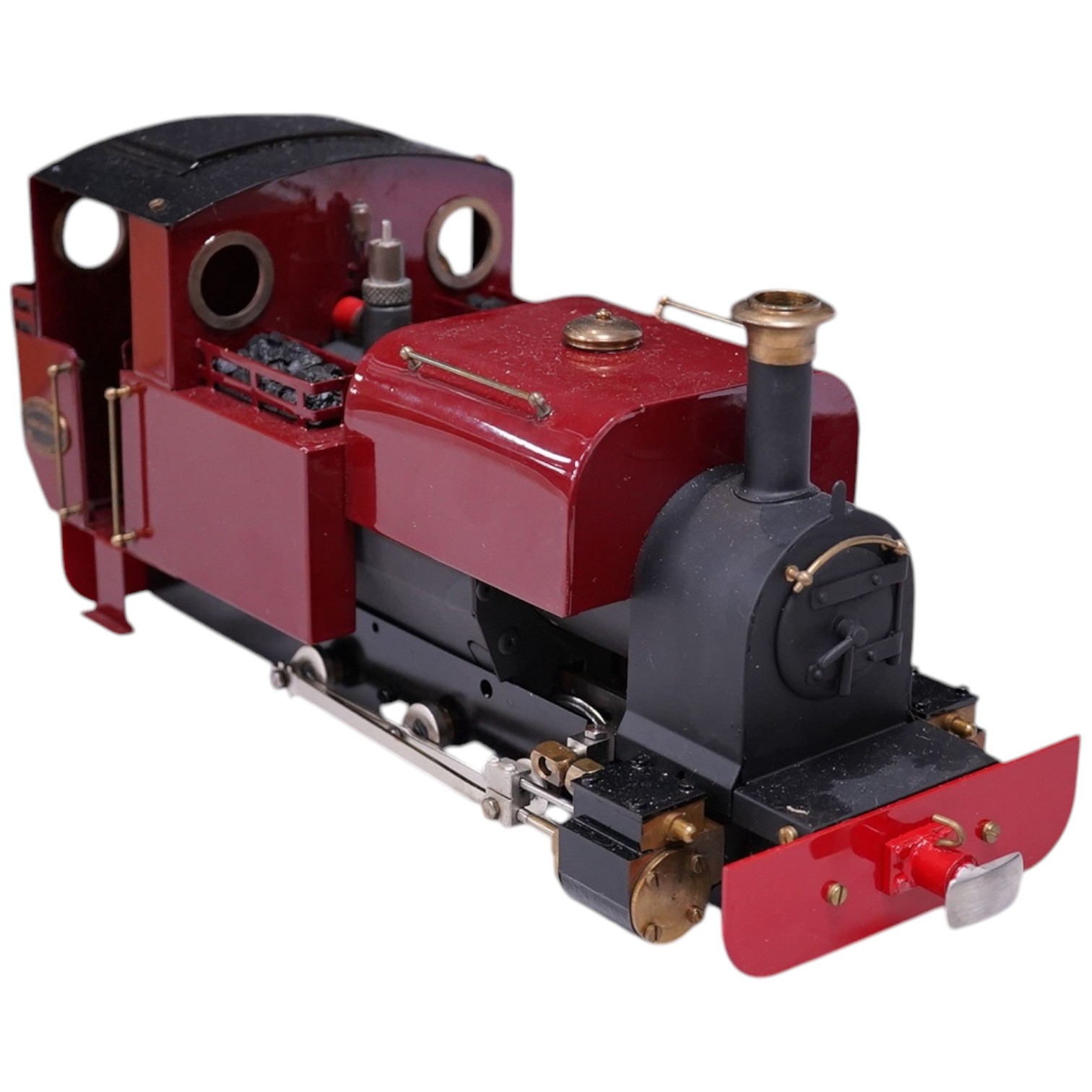 A Roundhouse 16mm scale live steam ‘Dylan’, 0-6-0ST meths fired locomotive for 45mm track, with slip eccentric valve gear, in maroon livery, with owners handbook. Condition - good.